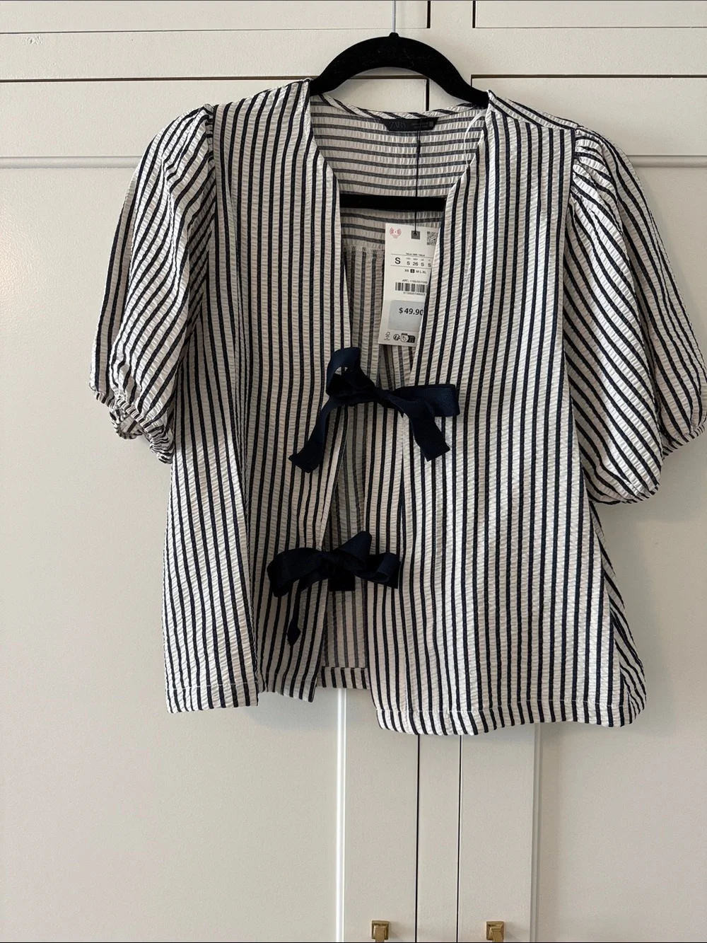 Zara striped navy and white striped puff sleeve top with front bows